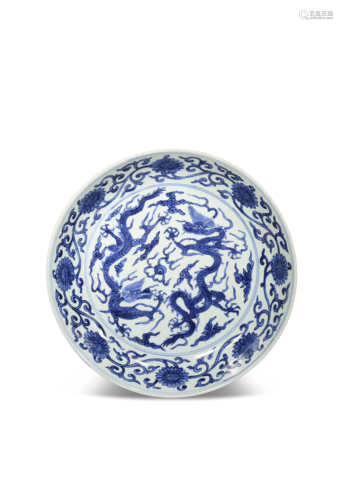 A CHINESE BLUE AND WHITE 'DRAGON' DISH PROBABLY LATE QING DYNASTY Painted to the centre with two