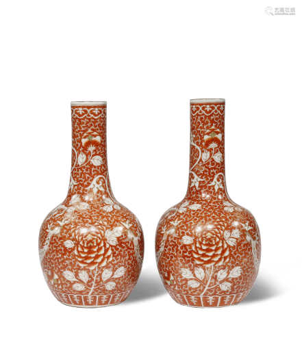 A PAIR OF CHINESE IRON RED-GROUND 'PHOENIX' BOTTLE VASES 19TH CENTURY The body of each decorated