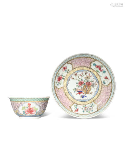 A CHINESE FAMILLE ROSE TEA BOWL AND SAUCER YONGZHENG 1723-35 Brightly decorated with cartouches