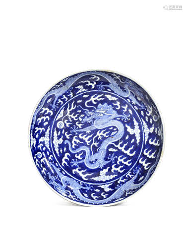 A CHINESE BLUE AND WHITE 'FIVE DRAGON' DISH SIX CHARACTER GUANGXU MARK AND OF THE PERIOD 1875-1908