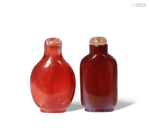 TWO CHINESE RED GLASS SNUFF BOTTLES 19TH CENTURY One a dark red colour with hints of magenta and