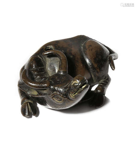 A CHINESE BRONZE 'WATER BUFFALO' WATER DROPPER LATE MING DYNASTY The animal lies with its head