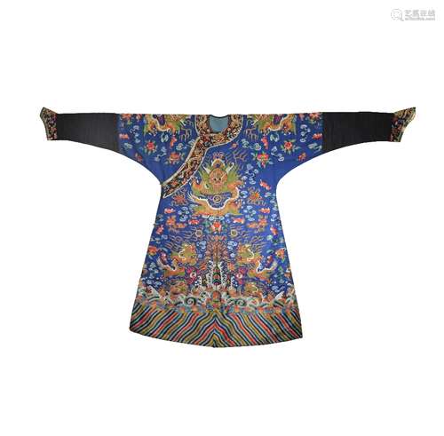 A CHINESE BLUE-GROUND FULL LENGTH FORMAL 'DRAGON' COURT ROBE LATE 19TH CENTURY Embroidered with nine