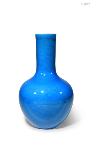 A CHINESE TURQUOISE GLAZED BOTTLE VASE 18TH CENTURY The ovoid body surmounted by a tall