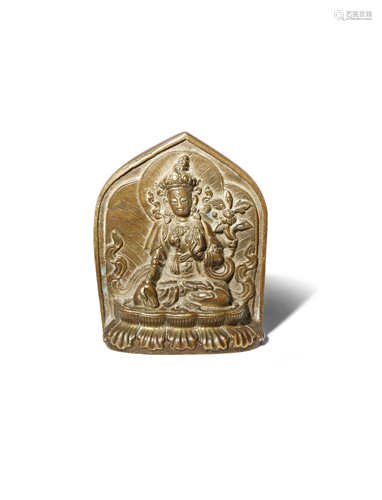 A TIBETAN BRONZE FIGURE OF WHITE TARA 19TH/20TH CENTURY Cast seated in dhyanasana on a lotus base