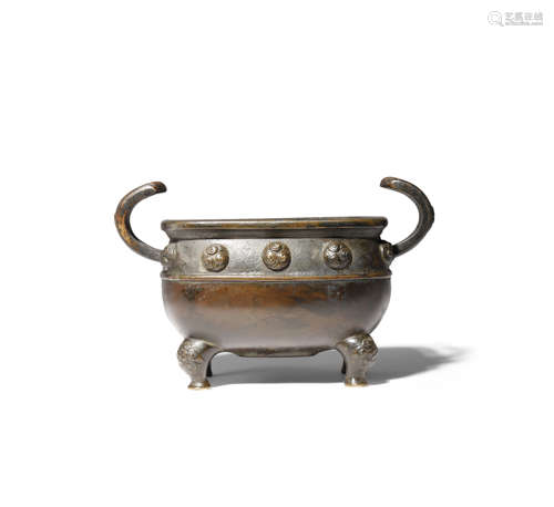 A CHINESE BRONZE INCENSE BURNER LATE MING DYNASTY The body cast with a band of raised studs, each