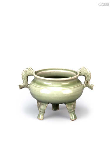 A CHINESE CELADON TRIPOD INCENSE BURNER YUAN/MING DYNASTY The compressed circular body with a