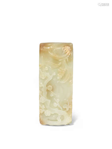 A CHINESE PALE CELADON JADE 'PRUNUS' BRUSH REST QING DYNASTY OR LATER Of rectangular form with