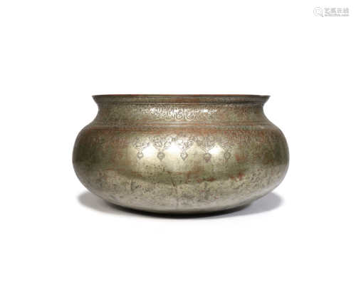 A SAFAVID TINNED-COPPER BASIN 16TH/17TH CENTURY Of compressed globular form with an everted rim,