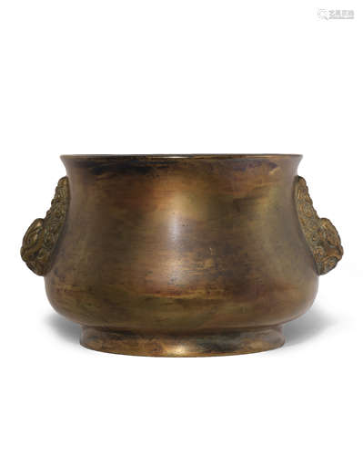 A CHINESE BRONZE INCENSE BURNER QING DYNASTY The bomb?-shaped body supported on a short flaring