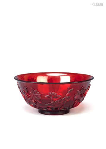 A CHINESE BEIJING RUBY-GLASS BOWL 18TH CENTURY Carved in relief with a single standing water bird