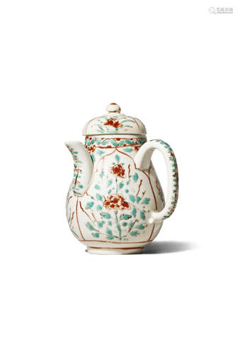 A CHINESE DEHUA CHOCOLATE POT AND COVER KANGXI 1662-1722 The pear-shaped body later decorated with