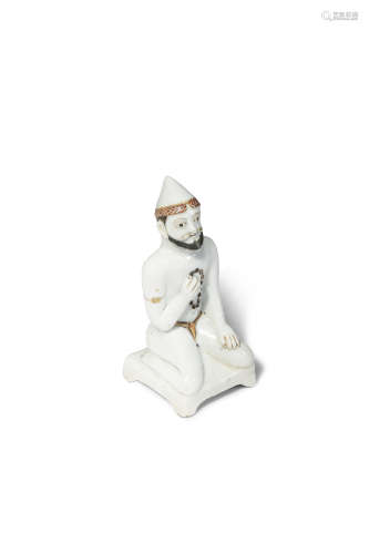 A RARE CHINESE PORCELAIN FIGURE OF A FOREIGNER 18TH/EARLY 19TH CENTURY Possibly depicting a man from