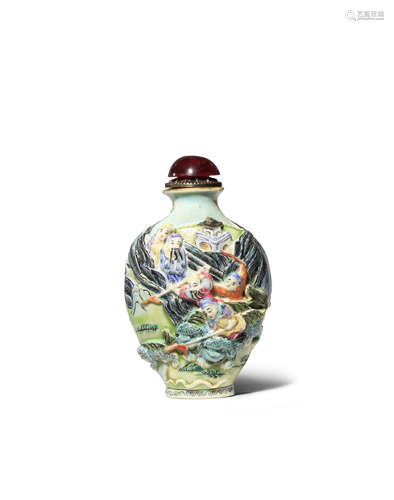 A CHINESE FAMILLE ROSE MOULDED SNUFF BOTTLE 19TH CENTURY The flattened ovoid body tapering towards