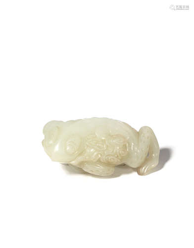 A CHINESE PALE CELADON JADE CARVING OF A THREE-LEGGED TOAD QING DYNASTY OR LATER Lying down with its