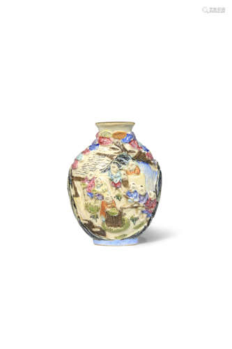 A CHINESE FAMILLE ROSE MOULDED SNUFF BOTTLE 19TH CENTURY The flattened ovoid body brightly painted