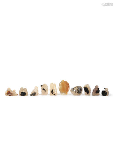 TEN CHINESE AGATE CARVINGS QING DYNASTY OR LATER Variously formed as children, animals, birds,