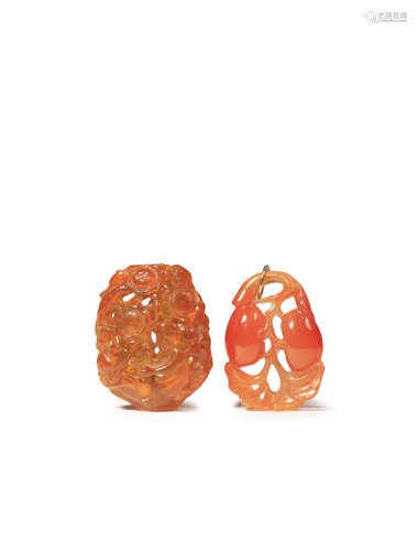 A CHINESE CARNELIAN AGATE PENDANT AND AN AMBER RETICULATED CARVING LATE QING DYNASTY The pendant