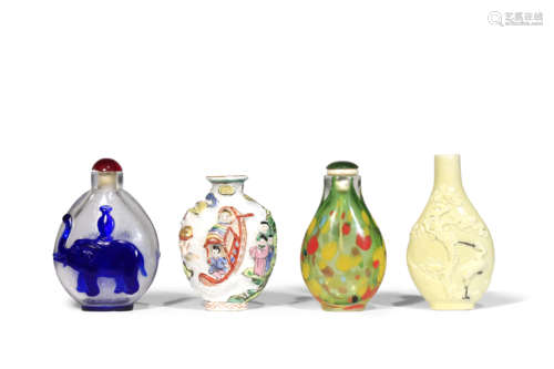 TWO CHINESE MOULDED SNUFF BOTTLES AND TWO GLASS SNUFF BOTTLES 19TH CENTURY One porcelain bottle