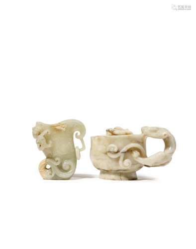 TWO CHINESE JADE LIBATION CUPS MING AND QING DYNASTY The handle of the larger cup formed as a