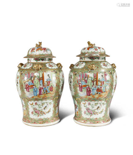 A PAIR OF CHINESE CANTON FAMILLE ROSE BALUSTER VASES AND COVERS 19TH CENTURY Each brightly painted