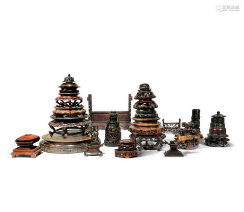 A LARGE COLLECTION OF CHINESE WOOD STANDS AND COVERS 19TH AND 20TH CENTURY Variously decorated
