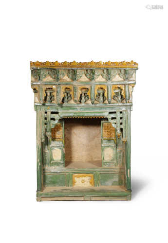 A CHINESE POTTERY MODEL OF A SHRINE MING DYNASTY The rectangular structure with a frieze elaborately