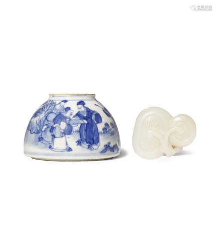 A CHINESE BLUE AND WHITE SOFT-PASTE WATERPOT AND A SMALL JADE CARVING 18TH CENTURY The waterpot with