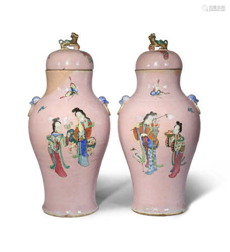A PAIR OF CHINESE FAMILLE ROSE PINK-GROUND VASES AND COVERS 19TH CENTURY Each brightly painted