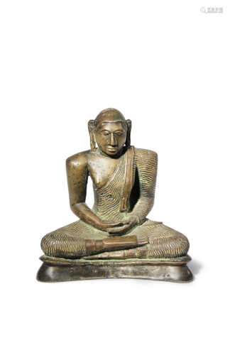 A SRI LANKAN BRONZE BUDDHA 18TH/19TH CENTURY Seated with his hands in dhyana mudra, wearing monk's