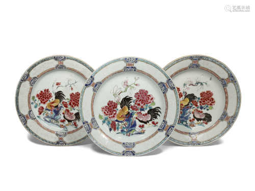A SET OF THREE CHINESE FAMILLE ROSE 'COCKERELS' DISHES QIANLONG 1736-95 Each painted to the centre