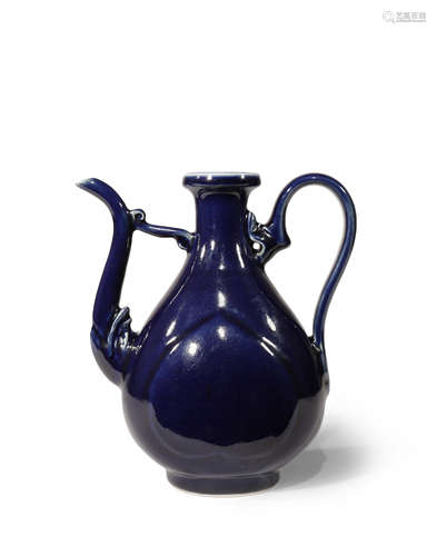 A CHINESE BLUE GLAZED EWER PROBABLY 19TH CENTURY The pear-shaped body covered with a deep blue glaze