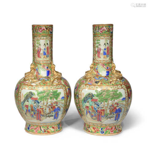 A PAIR OF CHINESE CANTON FAMILLE ROSE BOTTLE VASES 19TH CENTURY Each painted in enamels and gilt