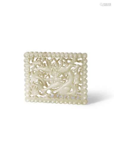 A FINE CHINESE PALE CELADON JADE PIERCED OPENWORK PLAQUE MING DYNASTY Of rectangular form, carved