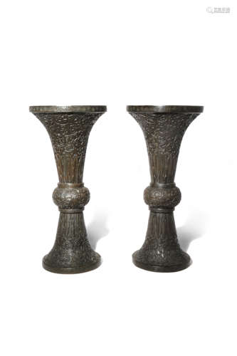 A PAIR OF CHINESE BRONZE GU-SHAPED VASES 18TH CENTURY Each with a wide rim and flared foot, cast