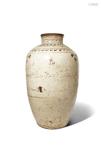 A MASSIVE CHINESE CIZHOU-TYPE STORAGE JAR YUAN/MING DYNASTY The ovoid body decorated with abstract