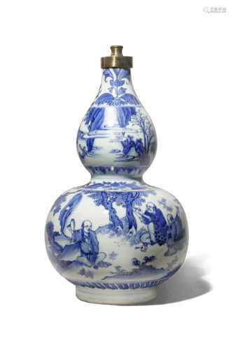 A CHINESE BLUE AND WHITE HULUPING TRANSITIONAL C.1640 Formed in the shape of a gourd, the upper