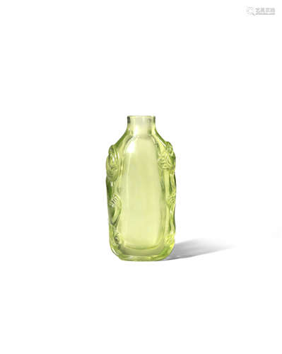 A RARE CHINESE LIME GREEN GLASS SNUFF BOTTLE 18TH CENTURY The transparent pale green ovoid body with