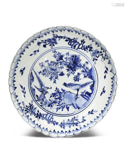 A CHINESE BLUE AND WHITE 'CHRYSANTHEMUM' DISH TIANQI 1621-27 The rounded sides moulded as petals,