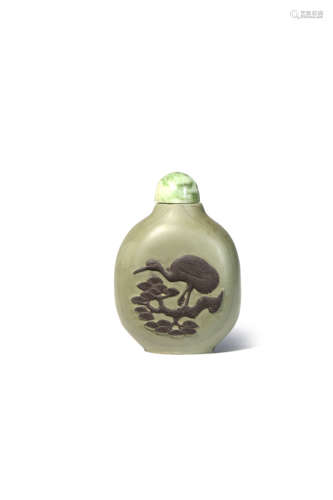 A CHINESE DUAN STONE SNUFF BOTTLE 19TH CENTURY The stone a grey-green colour, one side carved with a