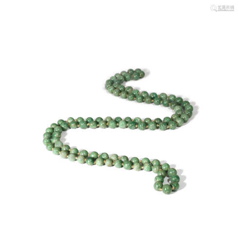 A CHINESE JADEITE NECKLACE 20TH CENTURY Consisting of one hundred and one beads, each with varying