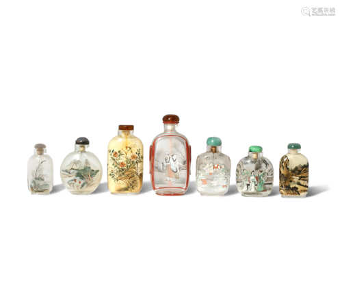 SEVEN CHINESE INTERIOR-PAINTED SNUFF BOTTLES 20TH CENTURY Variously decorated with birds, flowers,