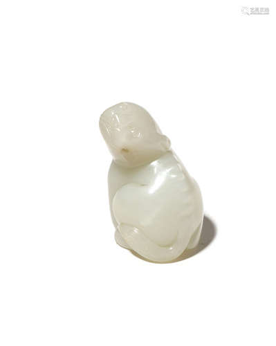 A CHINESE PALE CELADON JADE MYTHICAL BEAST QING DYNASTY OR LATER Seated with its head turned upwards