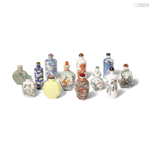 TWELVE CHINESE CERAMIC SNUFF BOTTLES 19TH AND 20TH CENTURY Comprising: eight painted in coloured