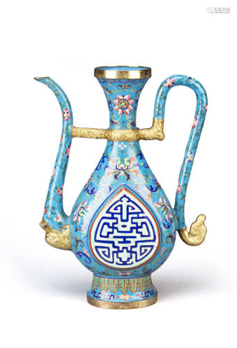 A CHINESE CANTON ENAMEL FAMILLE ROSE TIBETAN-STYLE EWER QING DYNASTY The pear-shaped body painted