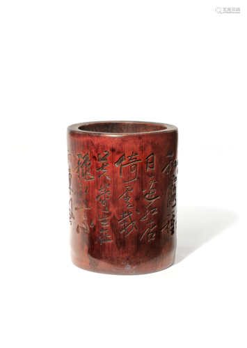 A CHINESE BAMBOO BITONG 18th/19th CENTURY The cylindrical body carved with calligraphy, the wood