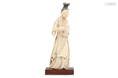 A CHINESE IVORY FIGURE OF AN IMMORTAL MAIDEN.