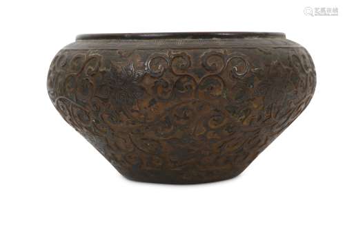 A CHINESE GILT-BRONZE 'LOTUS SCROLL' ALMS BOWL.