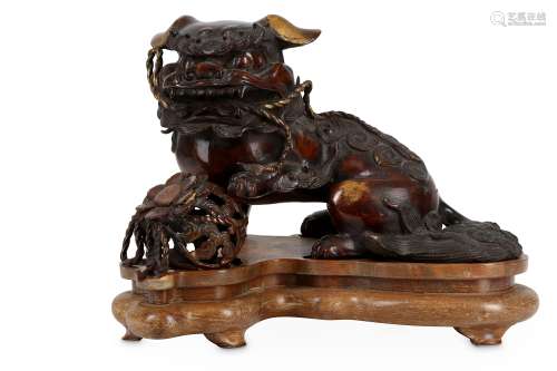 A BRONZE MODEL OF A SHISHI DOG.