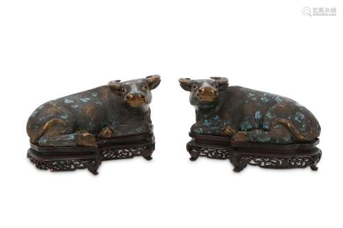 A PAIR OF CHINESE TURQUOISE-SPLASH GLAZED WATER BUFFALOES.
